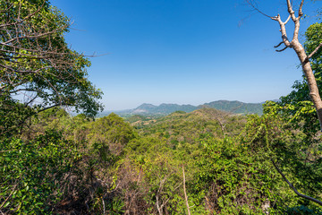 beautiful blue sky high peak mountains mist fog wildlife green forest at Phu Khao Hin Pakarang, Khao Koh, Phetchabun, Thailand. guiding idea long weekend for backpacker camping  hiking  
