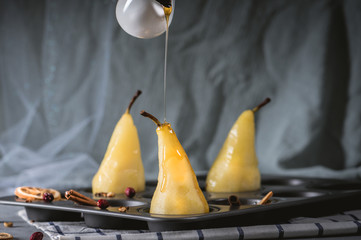 Sweet pears in syrup with spices