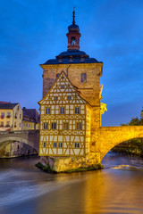 Fototapeta na wymiar The half-timbered Old Town Hall of Bamberg in Germany at night