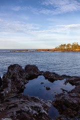 Wild Pacifc Trail, Ucluelet, Vancouver Island, BC, Canada. Beautiful View of the Rocky Ocean Coast during a colorful and vibrant morning sunrise.