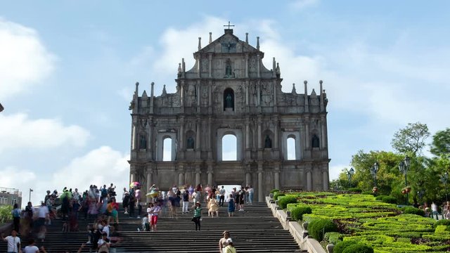 Tourists visit Macau St. Pauls church in China timelapse