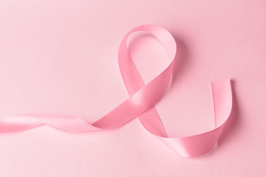 Woman health concept, pink breast cancer ribbon