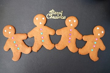 Christmas food. Gingerbread man cookies in Christmas concept settings background. Xmas dessert. background elements. Copy space