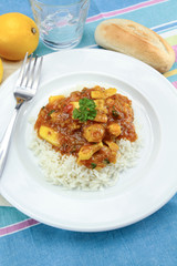 squid in tomato sauce on a plate