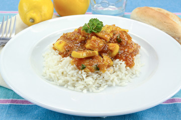 squid in tomato sauce on a plate