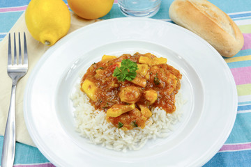 squid in tomato sauce on a plate