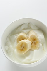 Banana and honey on yogurt for healthy breakfast