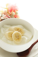 Banana and honey on yogurt for healthy breakfast