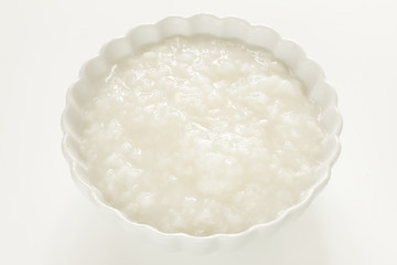 Chinese food, rice porridge in white bowl with copy space for healthy breakfast