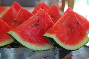 Tasty sliced watermelon on table 