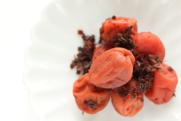 Japanese food, marinated plum Umeboshi on dish
