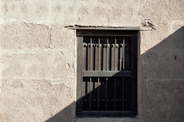 Obraz premium old window with shutters in Fujairah castle