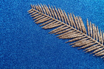 Artificial golden palm branch