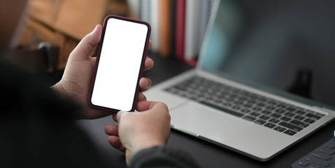 Close-up view of professional businessman holding bank screen smartphone