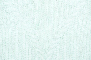 Blue knitted with a pattern textured background