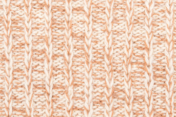 Brown knitted with a pattern textured background