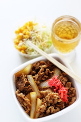 Japanese food, Gyudon simmered beef and onion on rice in take out lunch box