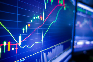 Blue stock exchange market graph on LED screen for business analysis. Finance and economic graphs.