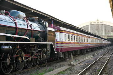 Fototapeta na wymiar Bangkok,Thailand-December 5, 2019: Double-headed steam locomotive train at Hua Lamphong station in Bangkok, Thailand
