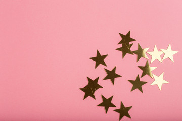 pink background with gold asterisks - obrazy, fototapety, plakaty