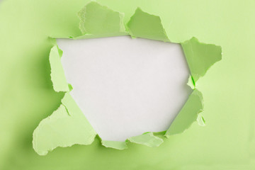a laceration torn in torn colored paper