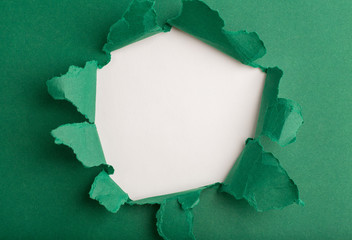 a laceration torn in torn colored paper