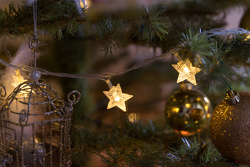 Obraz na płótnie Canvas tree with toys close-up. Christmas background. christmas holidays concept