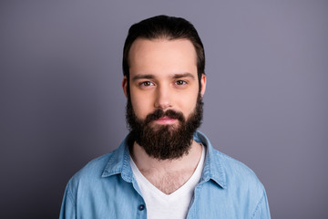 Obraz premium Closeup photo of amazing macho guy serious perfect appearance neat long hairdo bristle young promoted boss chief wear casual denim outfit isolated grey color background