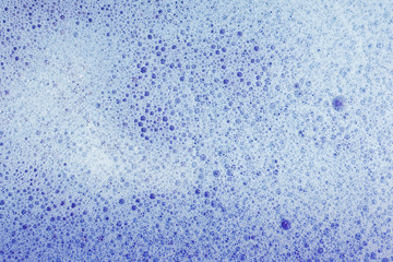 Soap bubbles background- suds liquid
