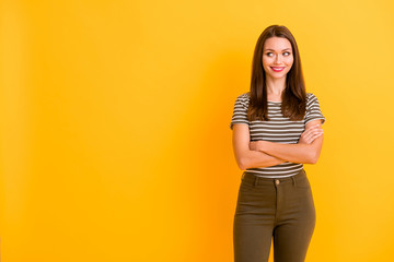 Portrait of charming content lady businesswoman stand crossed hands look copy space feel inspiration interested emotions work success wear stylish clothing isolated bright color background