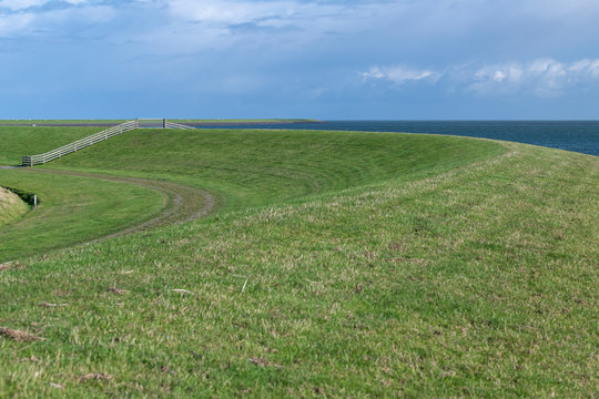 Wadden sea dike at the frisian island of Terschelling .