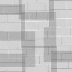 Grey abstract hand drawn bricks background