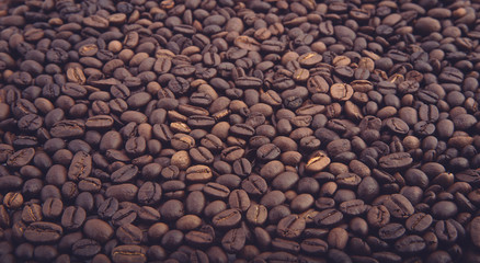 Roasted coffee beans closeup. Background texture.