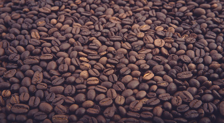 Roasted coffee beans closeup. Background texture.