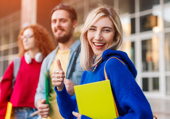 Cheerful student supporting university admission campaign