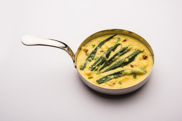 Dahi Bhindi or Okra in Yogurt Gravy, served in a bowl or karahi, selective focus