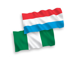 Flags of Nigeria and Luxembourg on a white background