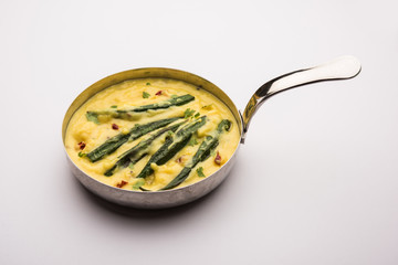 Dahi Bhindi or Okra in Yogurt Gravy, served in a bowl or karahi, selective focus