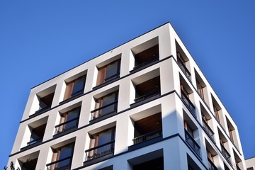 Modern and new apartment building. Multistoried modern, new and stylish living block of flats.