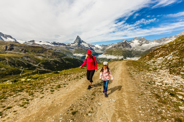 Obraz premium Family trekking, mother and daughter camping