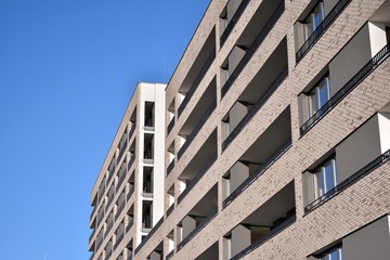 Modern and new apartment building. Multistoried modern, new and stylish living block of flats.