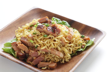 Asian food, roasted pork and ramen noodles