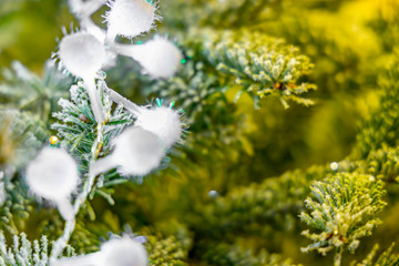 Garlands on the Christmas tree. Shallow depth of field.