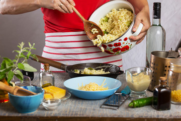 Cooking Pasta Elbow macaroni with broccoli