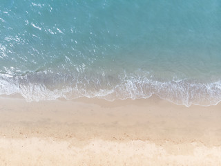 Blue sea and white sand beach in summer landscape for web advertisment and poster background.Aerial view of seashore coastline by drone