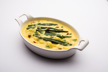Dahi Bhindi or Okra in Yogurt Gravy, served in a bowl or karahi, selective focus