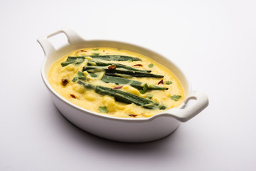 Dahi Bhindi or Okra in Yogurt Gravy, served in a bowl or karahi, selective focus