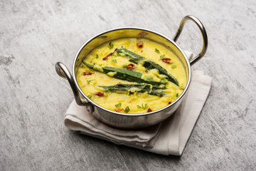 Dahi Bhindi or Okra in Yogurt Gravy, served in a bowl or karahi, selective focus