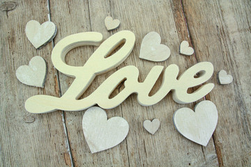 word love on a wooden background