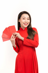 Beautiful asian woman holding lucky pocket money in the lunar new year. Festivities, New Year Celebration concept.